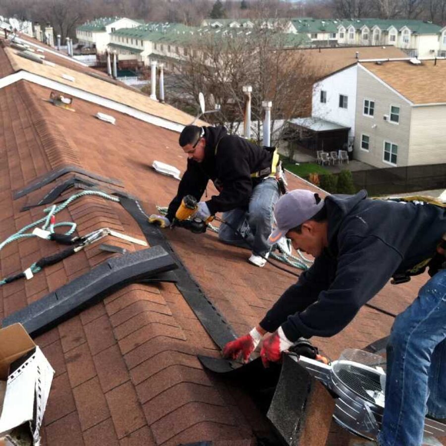 LaRocco crew installing architectural shingles on a Long Island roof